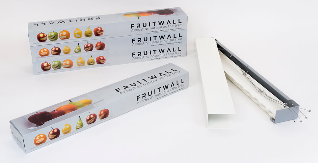 FRUITWALL desmontado con las piezas que contiene